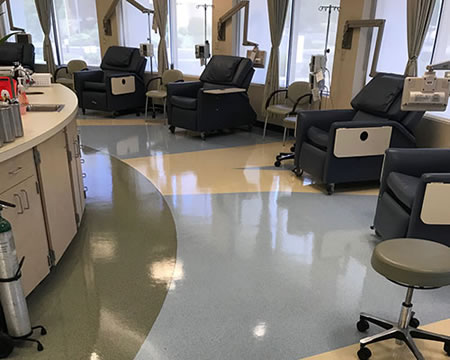 technician disinfecting a medical office reception in Medford, OR